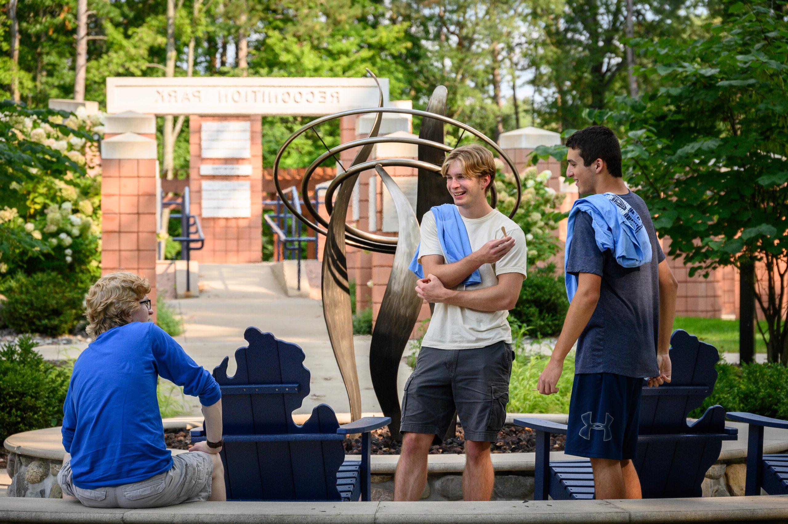 Students sitting and talking in the Founder's Garden